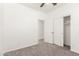 Comfortable bedroom with carpet, closet, and ceiling fan at 11182 W Coronado Rd, Avondale, AZ 85392