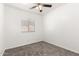 Cozy bedroom with plush carpet and a bright window at 11182 W Coronado Rd, Avondale, AZ 85392