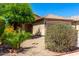 Charming single-story home with desert landscaping and a well-manicured front yard at 11182 W Coronado Rd, Avondale, AZ 85392