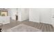 Inviting living area features sleek flooring with an easy flow to the kitchen at 11182 W Coronado Rd, Avondale, AZ 85392
