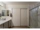 Bathroom with a modern sink, a new shower, and a tiled floor at 11252 E Edgewood Ave, Mesa, AZ 85208