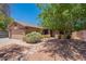 Charming single-story home with a well-manicured front yard and desert landscaping, offering great curb appeal at 11252 E Edgewood Ave, Mesa, AZ 85208