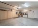 Spacious garage with ample storage cabinets and a practical layout at 11252 E Edgewood Ave, Mesa, AZ 85208