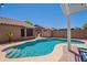 Private pool with tanning shelf and backyard landscaping at 11252 E Edgewood Ave, Mesa, AZ 85208