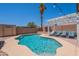 Sparkling private pool with lounge chairs and well-manicured landscaping at 11252 E Edgewood Ave, Mesa, AZ 85208