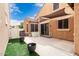 Outdoor patio with planters, sunshades and artificial grass at 1134 S Lydia Ln, Gilbert, AZ 85296