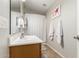 Neutral bathroom with vanity, chrome faucet, and decor at 1134 S Lydia Ln, Gilbert, AZ 85296