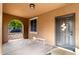 Welcoming front porch with neutral tones, ample space, and a cozy seating area at 1134 S Lydia Ln, Gilbert, AZ 85296