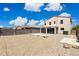 Spacious backyard, fully fenced with a gravel ground cover, and patio area at 12531 W Glenn Dr, Glendale, AZ 85307