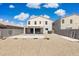 Spacious backyard with gravel landscaping, block wall fencing and a covered patio at 12531 W Glenn Dr, Glendale, AZ 85307