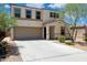 Charming two-story home with a spacious driveway and a neutral color palette at 12531 W Glenn Dr, Glendale, AZ 85307