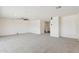 Expansive living area with neutral carpet, recessed lighting, and ample space for versatile layouts at 12531 W Glenn Dr, Glendale, AZ 85307