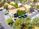 Aerial view of a residential community with manicured landscaping, assigned covered parking, and neighborhood streets at 1287 N Alma School Rd # 171, Chandler, AZ 85224