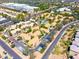 High altitude view of a well maintained community featuring private parking, mature landscaping, and plentiful amenities at 1287 N Alma School Rd # 171, Chandler, AZ 85224