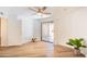 Spacious bedroom with ceiling fan and sliding glass door to outdoor space at 1287 N Alma School Rd # 171, Chandler, AZ 85224