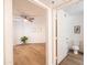 Hallway offering entry to a bathroom and bedroom area with wood-look flooring at 1287 N Alma School Rd # 171, Chandler, AZ 85224