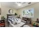 Bright ' bedroom with a comfortable bed, playful decor, and large window at 1311 W Ellis St, Mesa, AZ 85201