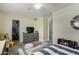 Another view of a bedroom with playful decor, a storage dresser, and a closet at 1311 W Ellis St, Mesa, AZ 85201