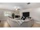 Comfortable living room featuring a fireplace, large sectional sofa, and bright natural light at 1311 W Ellis St, Mesa, AZ 85201