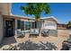 Charming patio featuring stylish outdoor furniture and a welcoming entryway at 1311 W Ellis St, Mesa, AZ 85201