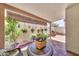 Charming covered patio with potted plants and tiled flooring at 13219 N 26Th Ave, Phoenix, AZ 85029