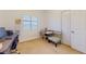 Study in bedroom with a desk, chair, and natural light creates an ideal work or study space at 16537 N Oachs Dr, Surprise, AZ 85374