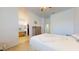 Neutral bedroom with walk in closet and attached bathroom offering a calm and inviting atmosphere at 16537 N Oachs Dr, Surprise, AZ 85374