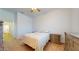Cozy bedroom featuring a comfortable bed, nightstands, and a dresser at 16537 N Oachs Dr, Surprise, AZ 85374