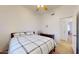 A simple bedroom with neutral walls and carpeted floors at 16537 N Oachs Dr, Surprise, AZ 85374