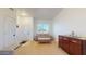 Bright living room with a cozy couch, large window, and modern decor at 16537 N Oachs Dr, Surprise, AZ 85374
