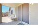 Outdoor patio area with seating and access to the backyard at 16537 N Oachs Dr, Surprise, AZ 85374