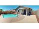 A private swimming pool area with a covered patio and secure fencing for outdoor entertaining at 16537 N Oachs Dr, Surprise, AZ 85374