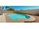 Refreshing in-ground pool with clear blue water and ample space for relaxation and entertainment at 16537 N Oachs Dr, Surprise, AZ 85374