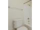 Close up on a white tiled bathtub and toilet in a clean and well-maintained bathroom at 1825 W Ray Rd # 1070, Chandler, AZ 85224