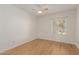 Comfortable bedroom featuring wood-look flooring and a window for natural light at 1825 W Ray Rd # 1070, Chandler, AZ 85224