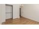 Bedroom with light wood flooring, standard closet, and neutral paint at 1825 W Ray Rd # 1070, Chandler, AZ 85224