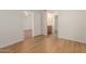 Bedroom with wood-look floors and en suite bathroom at 1825 W Ray Rd # 1070, Chandler, AZ 85224
