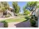 Scenic courtyard featuring lush landscaping, green lawns, and walking paths at 1825 W Ray Rd # 1070, Chandler, AZ 85224