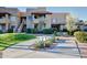 Charming multi-story building with well-manicured landscaping, mature trees, and inviting curb appeal at 1825 W Ray Rd # 1070, Chandler, AZ 85224
