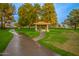 Community gazebo with a picnic table, surrounded by trees and green space at 1825 W Ray Rd # 1070, Chandler, AZ 85224