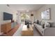 Modern living room with stylish furniture and sliding glass doors to patio at 1825 W Ray Rd # 1070, Chandler, AZ 85224