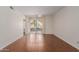 Spacious unfurnished living room with tiled floors and sliding glass doors to patio at 1825 W Ray Rd # 1070, Chandler, AZ 85224