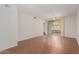 Bright, empty living room with tile flooring, sliding glass doors, and ceiling fan at 1825 W Ray Rd # 1070, Chandler, AZ 85224