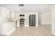 Bright, modern kitchen featuring stainless steel appliances, hexagon backsplash and wood-look floors at 1906 N Evergreen St, Chandler, AZ 85225