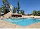 Beautiful community pool on a sunny day at 1914 S Brooks Cir, Mesa, AZ 85202