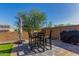 Stunning backyard with artificial grass and an outdoor dining area, ideal for entertaining and relaxation at 2023 W Yellowbird Ln, Phoenix, AZ 85085