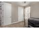 Cozy bedroom featuring two closets and natural light at 2023 W Yellowbird Ln, Phoenix, AZ 85085
