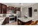 Well-equipped kitchen showcasing granite countertops, stainless steel appliances, and ample cabinetry at 2023 W Yellowbird Ln, Phoenix, AZ 85085