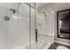 Clean shower with a built-in seat and glass enclosure at 2023 W Yellowbird Ln, Phoenix, AZ 85085