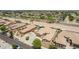 Bird's eye view of a neighborhood featuring uniform houses, desert landscaping, and community design at 21284 E Camacho Rd, Queen Creek, AZ 85142